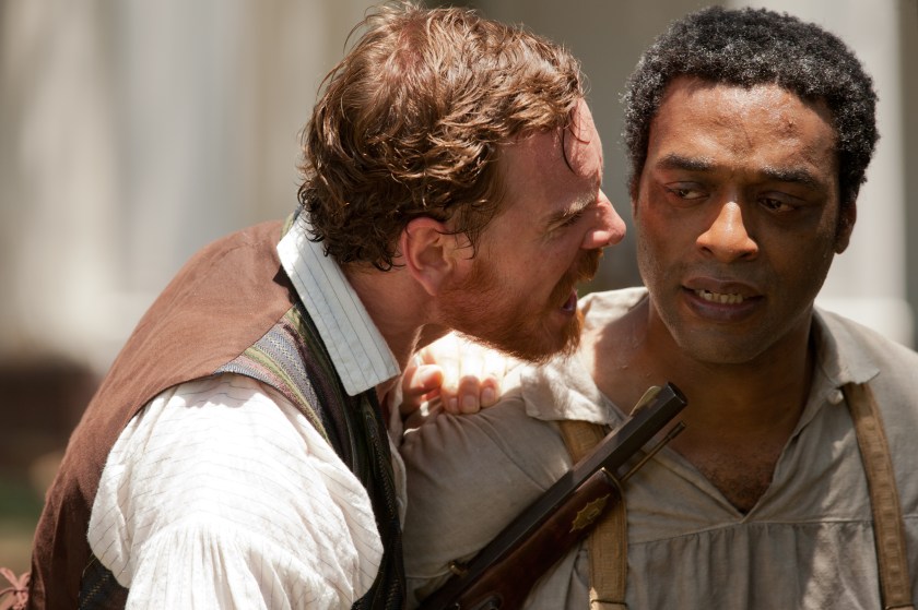 Michael Fassbender as Edwin Epps and Chiwetel Ejiofor as Solomon Northup in 12 Years a Slave